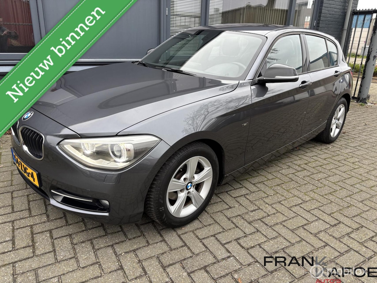 BMW 1-serie - 116i Sport Airco Navi prof. Bl.Tooth Xenon LMV PDC 5drs - AutoWereld.nl