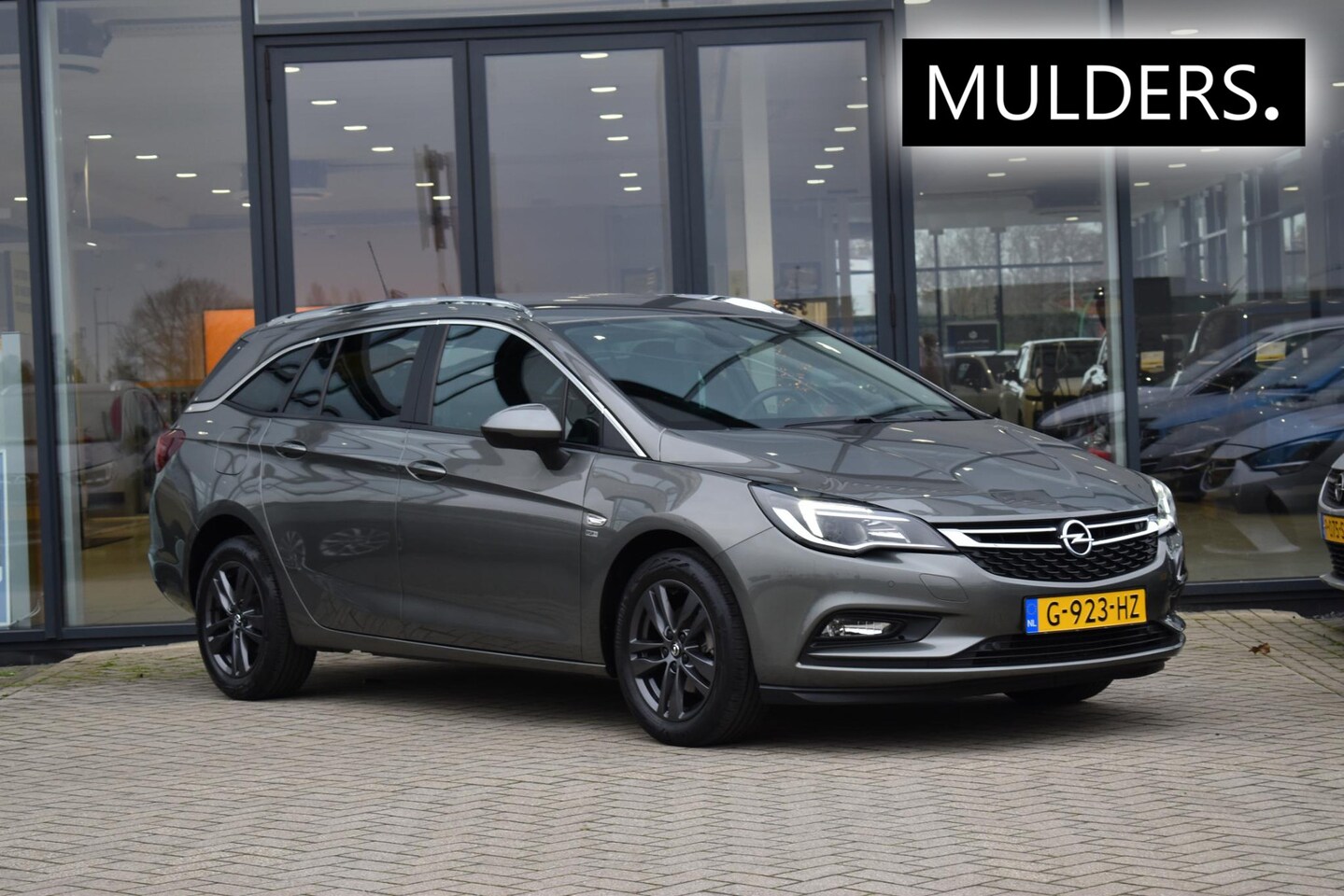 Opel Astra Sports Tourer - 1.0 Turbo 120 Jaar Edition | Cruise / Airco / - AutoWereld.nl