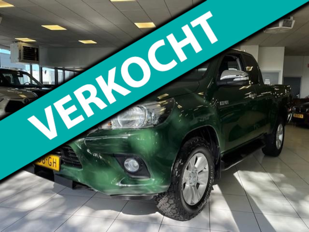 Toyota HiLux - 2.4 D-4D-F Xtra Cab Professional 4X4/1e Eigenaar/NAP/Camera/Airco/Navi/Cruise control - AutoWereld.nl