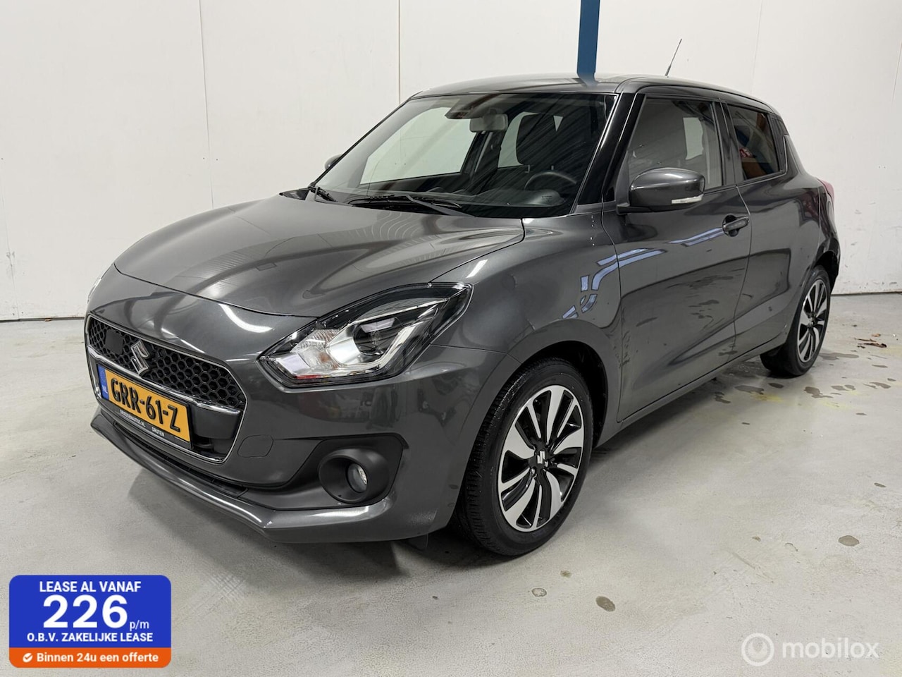 Suzuki Swift - 1.2 Stijl Smart Hybrid NAVI/LED/ACC - AutoWereld.nl