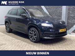 Skoda Karoq - 1.5 TSI ACT Sportline Business | Trekhaak | ACC | Camera | Stuur+Stoelverwarming | Navigat