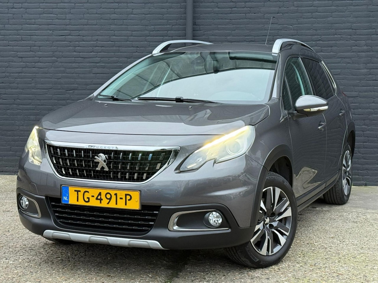 Peugeot 2008 - 1.2 PureTech Allure NAVI | CAMERA | PDC | CRUISE | TREKHAAK | NWE APK - AutoWereld.nl