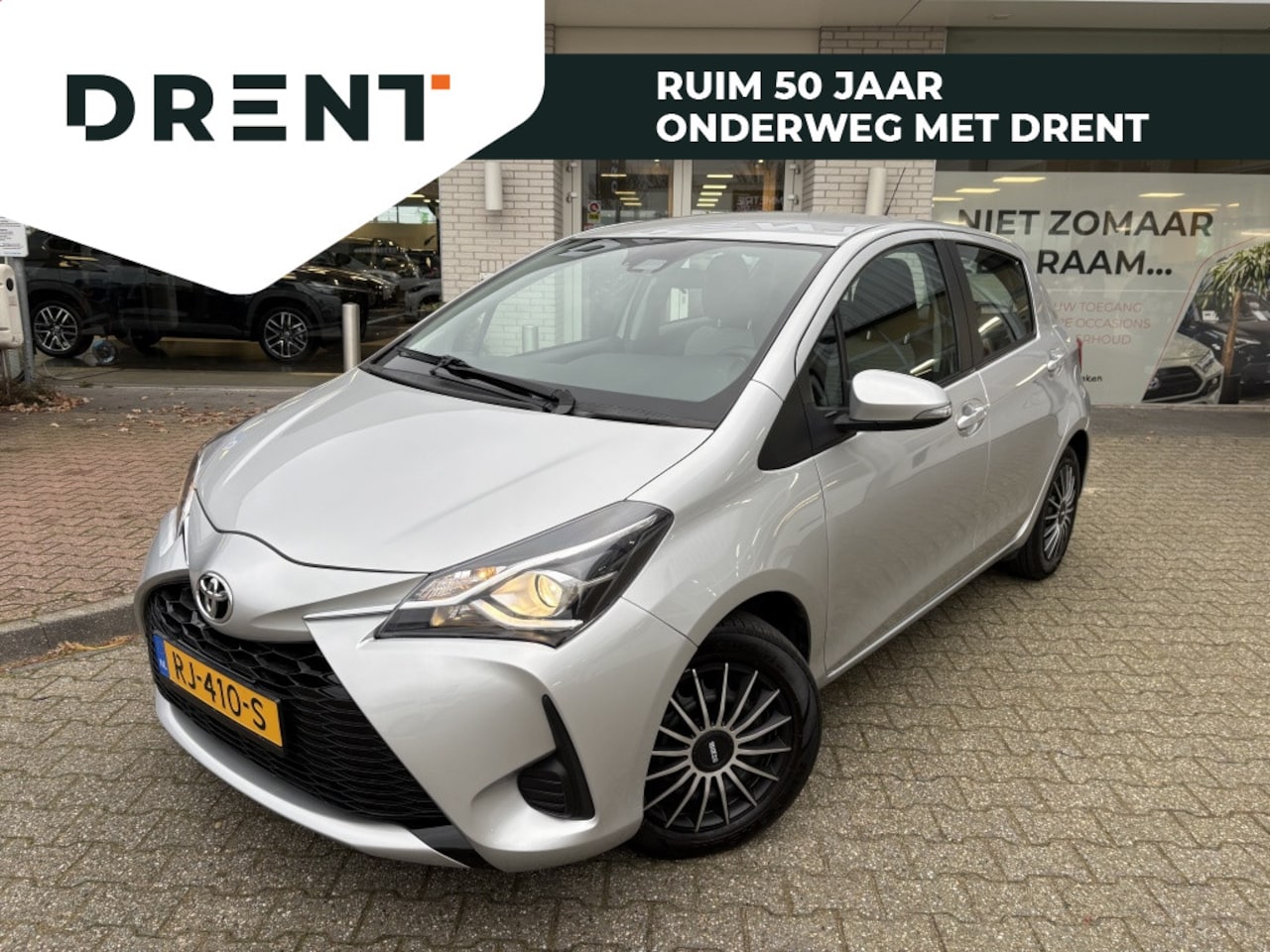 Toyota Yaris - 1.5 Hybrid Aspiration | Cruise control | All-season | Navigatie - AutoWereld.nl