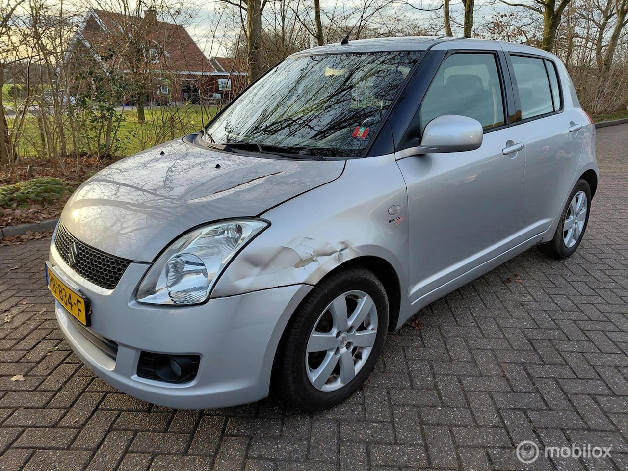 Suzuki Swift - 1.3 Bandit Airco NAP 157802 KM APK 29-6-2026 - AutoWereld.nl