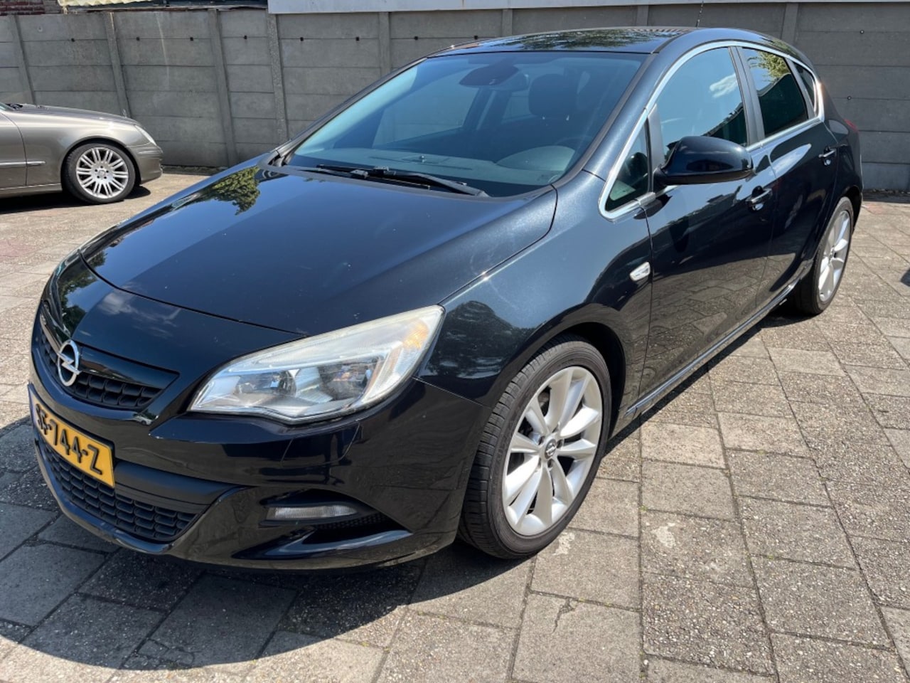 Opel Astra - 1.6 Turbo Sport 1.6 TURBO SPORT, LICHTMETAAL,SFEERVERLICHTING, COMPLETE AUTO. - AutoWereld.nl