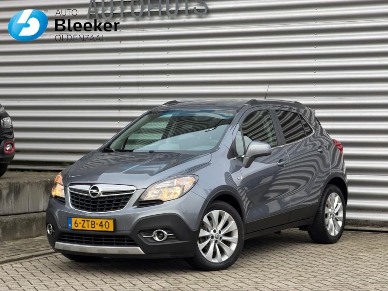 Opel Mokka - 1.4T Cosmo Airco Cruise Navi Trekhaak AGR Leder - AutoWereld.nl