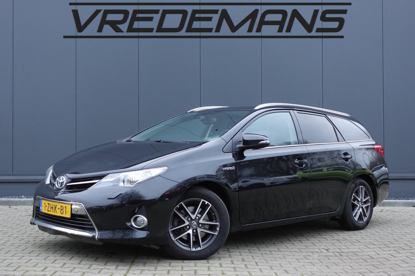 Toyota Auris Touring Sports - 1.8 Hybrid Lease PANO/CLIMA/NAVI - AutoWereld.nl