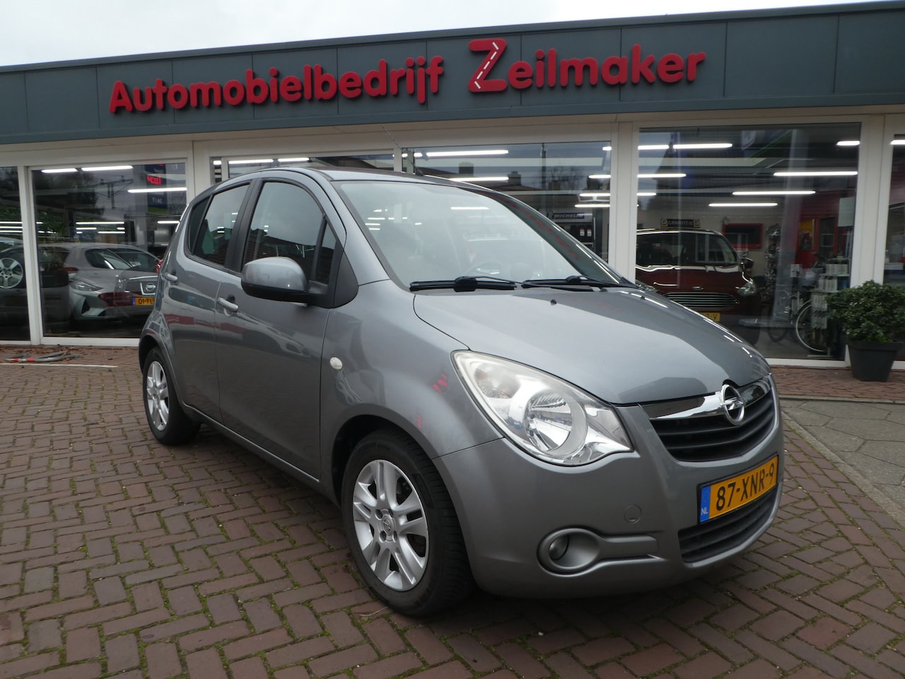 Opel Agila - 1.0 Edition Airco, Stuurbekrachtiging, Lm velgen, extra donker glas - AutoWereld.nl