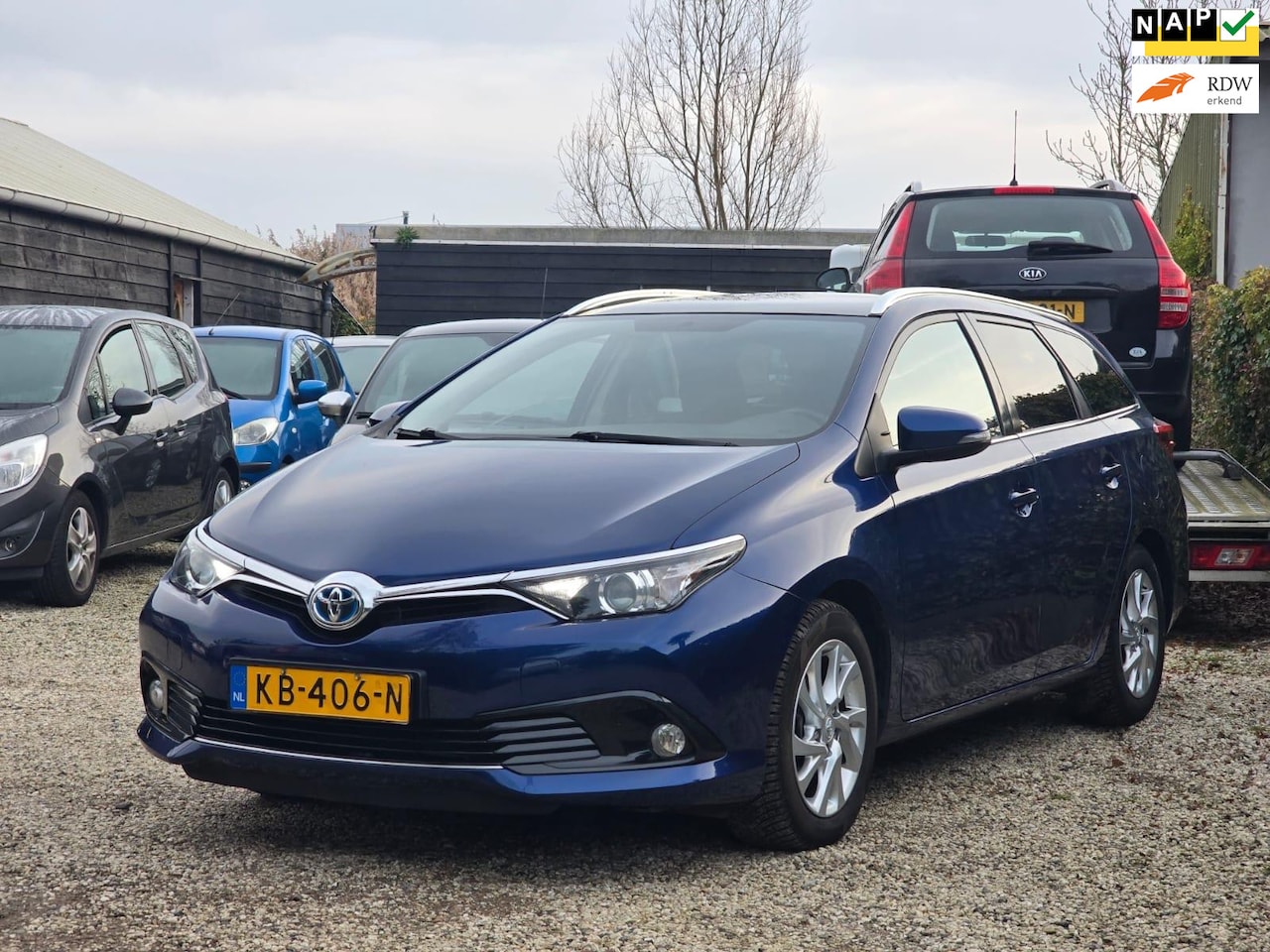 Toyota Auris - 1.8 Hybrid Panodak/Camera/Clima/LED - AutoWereld.nl