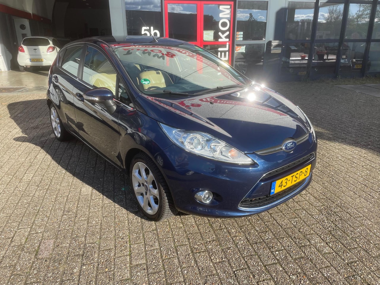 Ford Fiesta - 1.25 Titanium clima leer nette auto - AutoWereld.nl