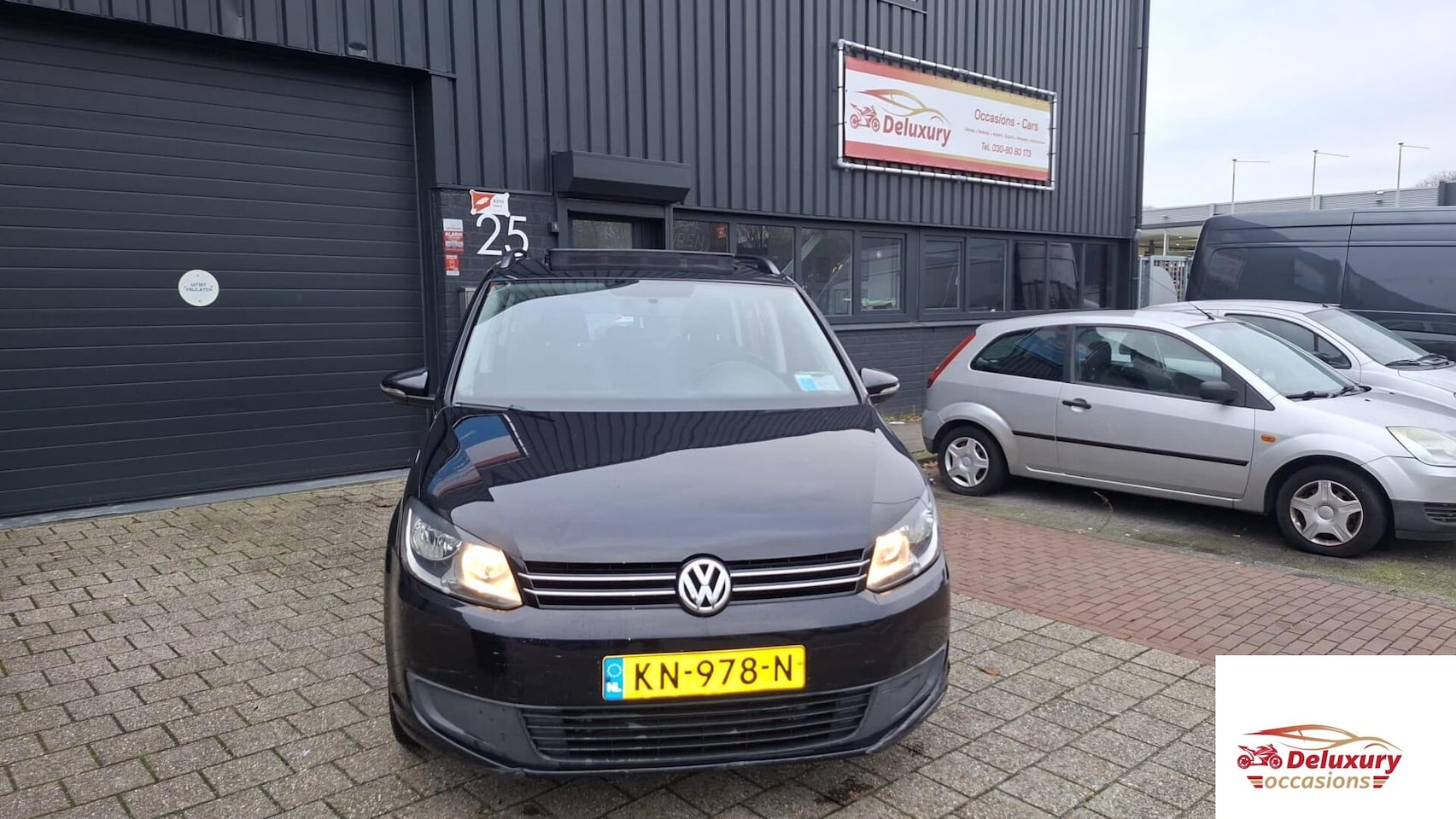 Volkswagen Touran - 1.6 TDI Comfortline BlueMotion Panorama - AutoWereld.nl