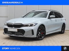 BMW 3-serie Touring - 330e High Executive M Sport Automaat / Panoramadak / Trekhaak / Sportstoelen / Comfort Acc