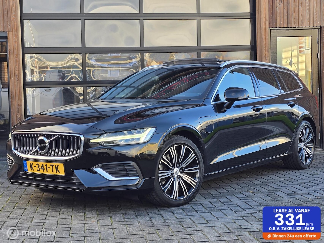 Volvo V60 - 2.0 T6 RECHARGE AWD PANO LEER ACC TREKHAAK INSCRIPTION - AutoWereld.nl