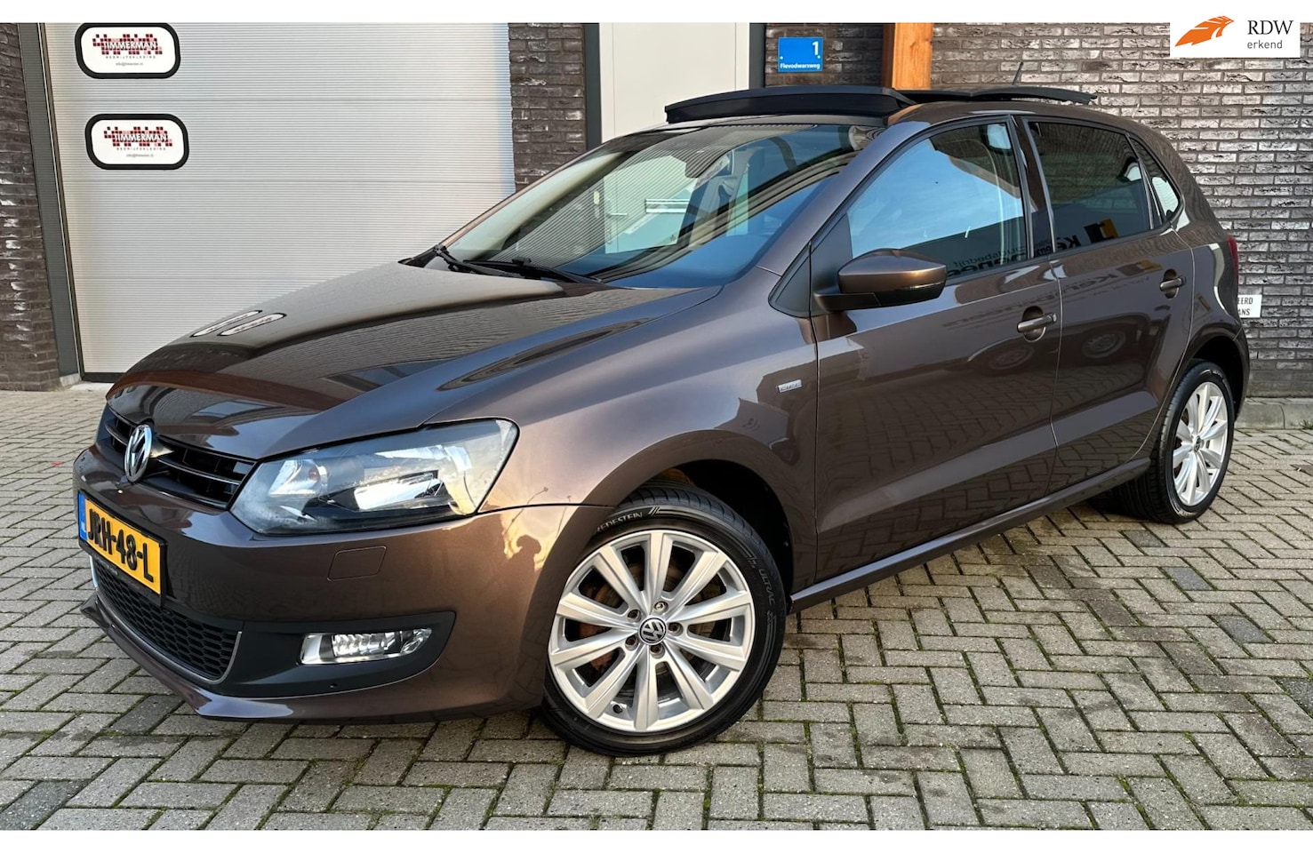 Volkswagen Polo - 1.2 TSI Highline PANO/DSG/STOELVW/NAVI/PDC - AutoWereld.nl