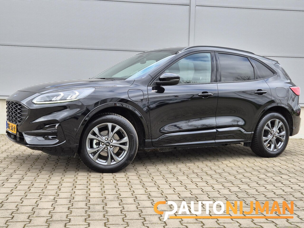 Ford Kuga - 2.5 PHEV ST-Line/Panodak/Elect.A.Klep/Driveass. Panoramadak/Winterpack/Driveass./elect.a.k - AutoWereld.nl
