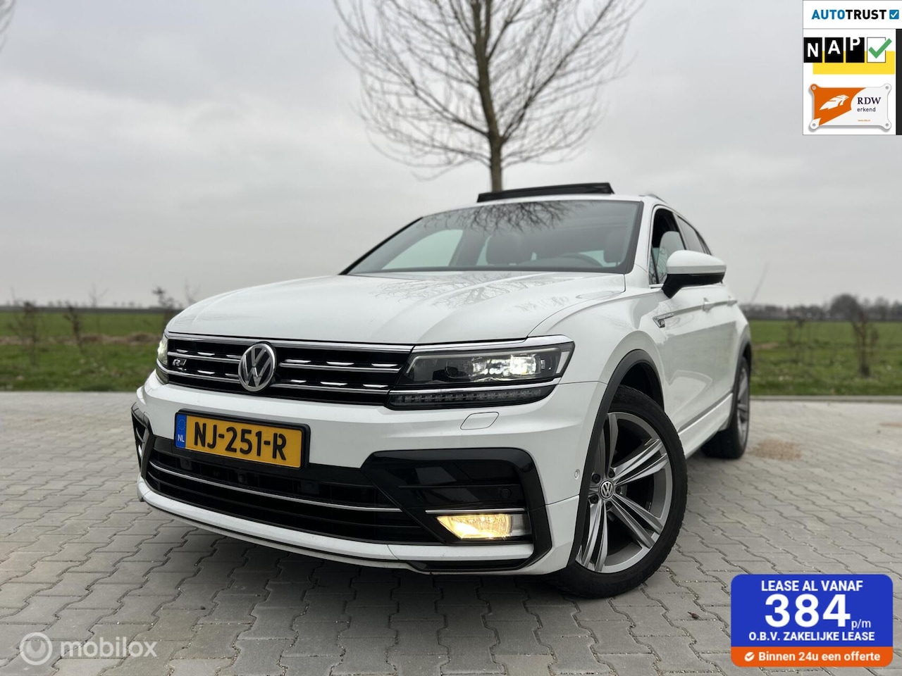 Volkswagen Tiguan - 1.4 TSI ACT R-LINE|APK|STOELV|TREKH|PANO - AutoWereld.nl