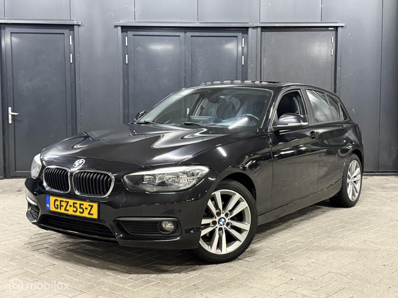 BMW 1-serie - 118i M Sport schuifdak|carplay|stoelverwarming! - AutoWereld.nl