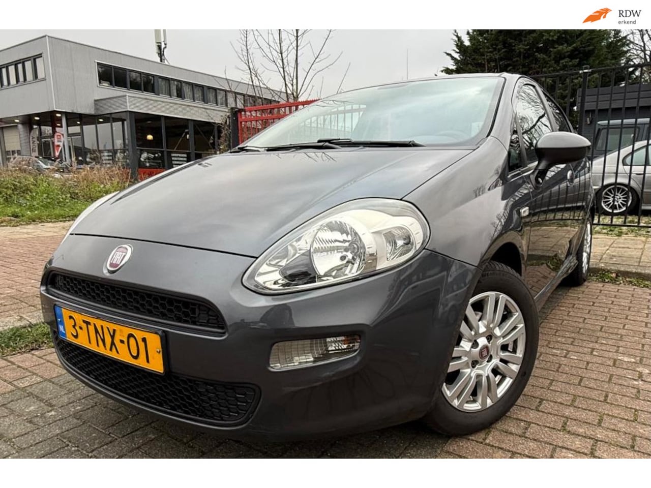 Fiat Punto Evo - 0.9 TwinAir Street / APK/NAP/O.H Boekjes - AutoWereld.nl