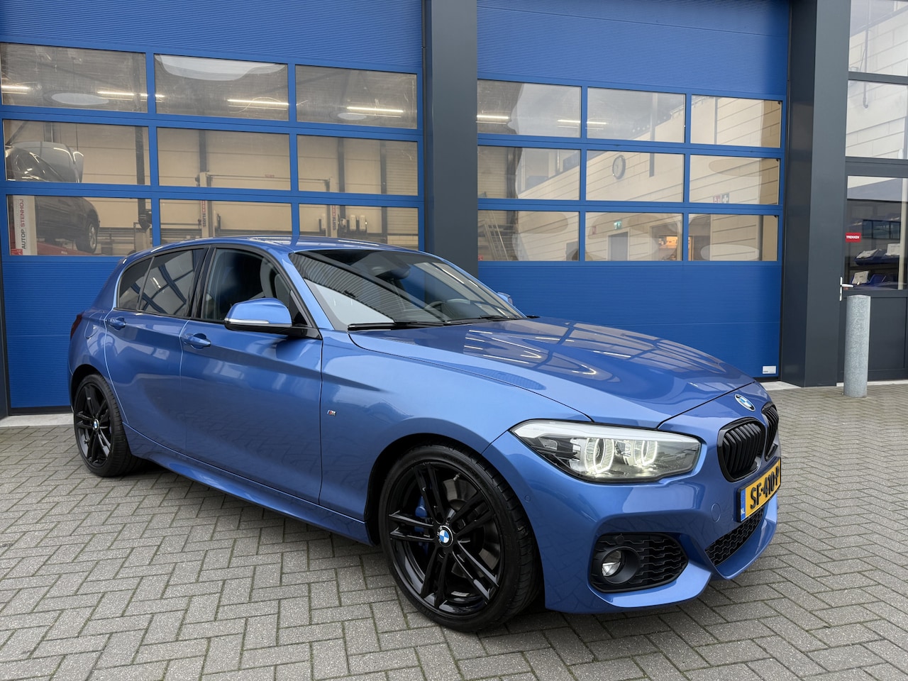 BMW 1-serie - 118i 1.5 136pK M-Pakket/ Alcantara/ Automaat/ Led High Executive - AutoWereld.nl