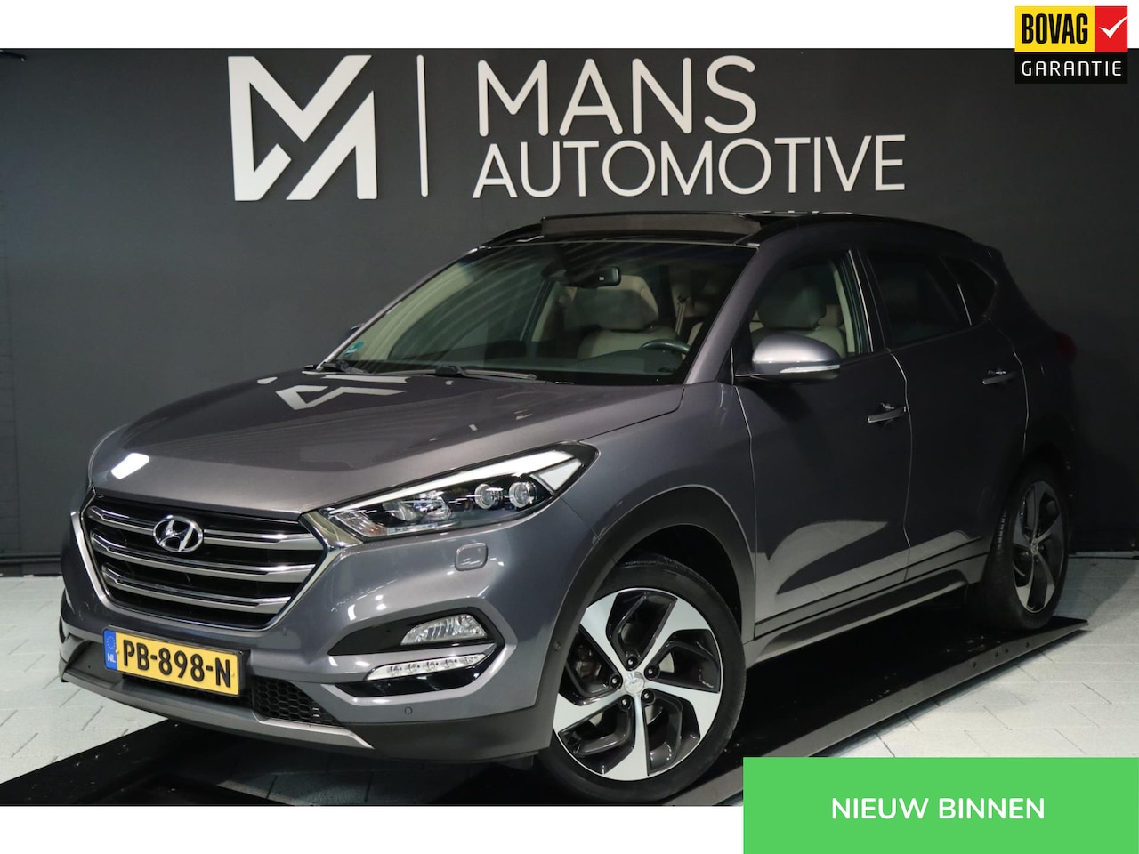 Hyundai Tucson - 1.6 T-GDi Premium 4WD / PANO / KEYLESS / CAMERA / VOLLEDIG UITGEVOERD! - AutoWereld.nl
