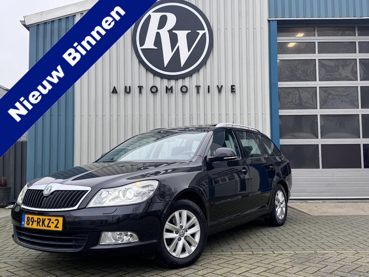 Skoda Octavia Combi - 1.8 TSI Elegance / Xenon / Dak / Gr Navi / Trekhaak / NL Auto / Top onderhouden! - AutoWereld.nl