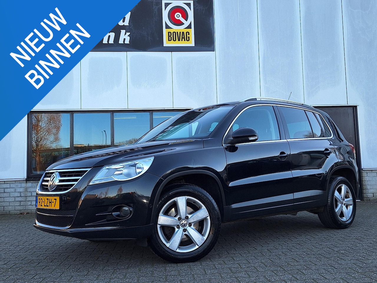 Volkswagen Tiguan - 2.0 TDI 140PK Sport & Style STOELVERW TREKHAAK - AutoWereld.nl