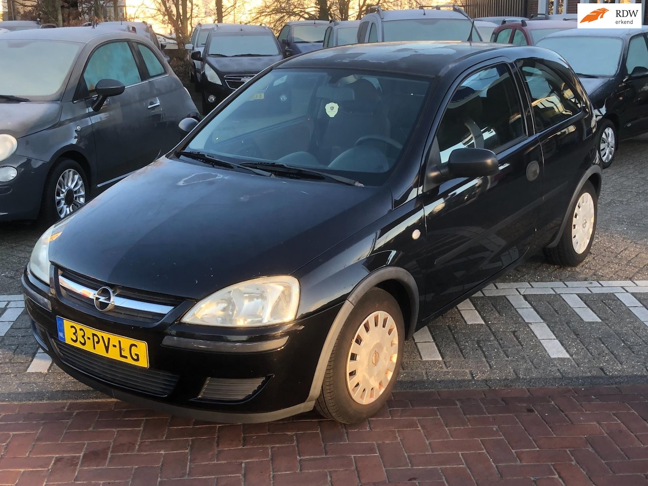 Opel Corsa - 1.2-16V Rhythm 1.2-16V Rhythm NIEUWE APK - AutoWereld.nl