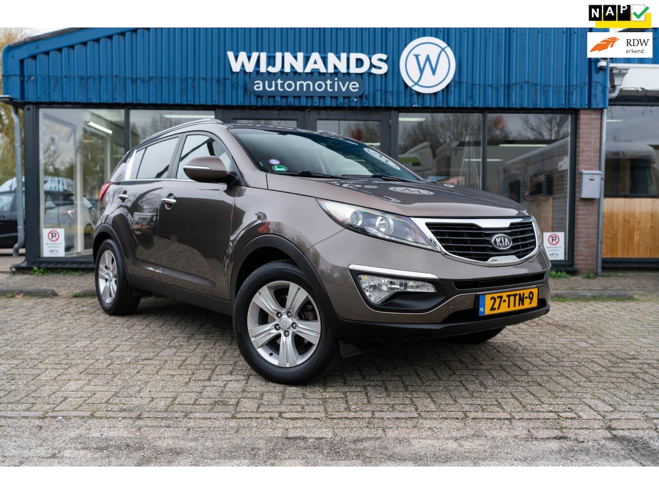Kia Sportage - 2.0 X-ecutive Plus Pack Trekhaak Cruise Clima - AutoWereld.nl