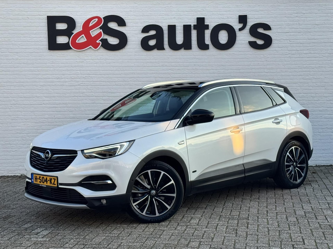 Opel Grandland X - 1.6 Turbo Hybrid4 Ultimate AWD Climate Cruise Stoelverwarming/-ventilatie Navi Sensoren+ca - AutoWereld.nl