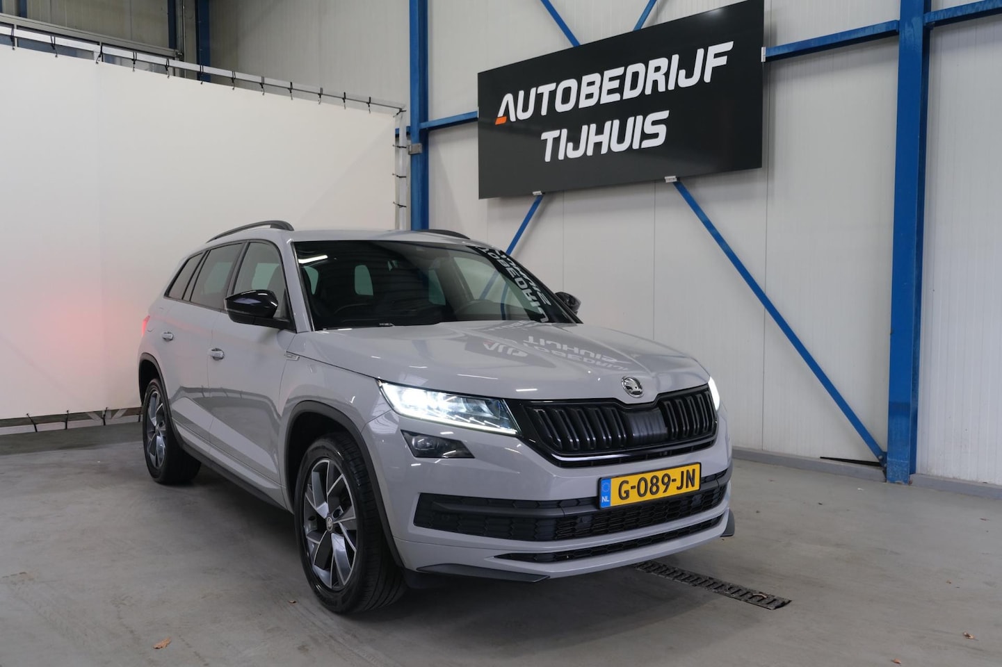 Skoda Kodiaq - 1.5 TSI Sportline Business Automaat - Airco, Cruise, Navi, PDC, Trekhaak. - AutoWereld.nl