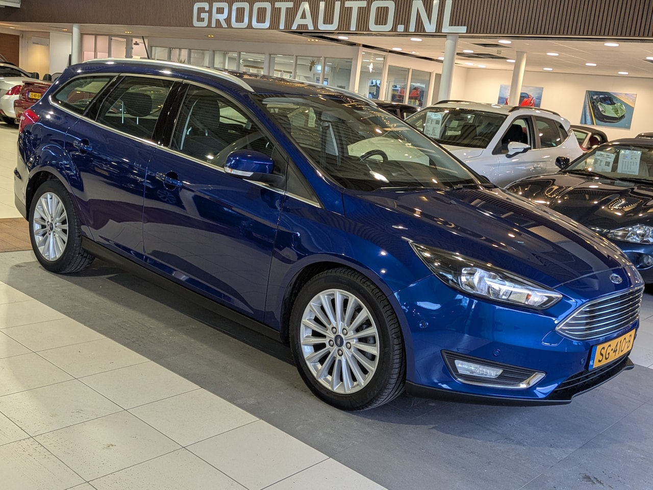 Ford Focus Wagon - 1.0 Titanium Airco, Cruise Control, Trekhaak, Stuurbekrachtiging - AutoWereld.nl