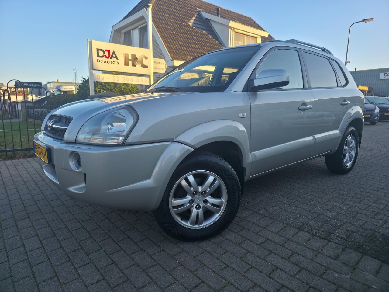 Hyundai Tucson - 2.0i Dynamic met Trekhaak! - AutoWereld.nl