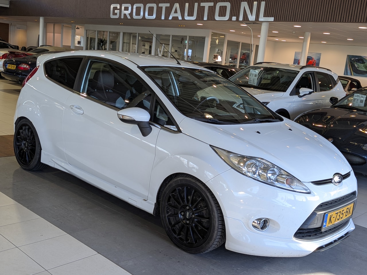Ford Fiesta - 1.6 Ghia ST-Look Airco, Cruise Control, Stuurbekrachtiging - AutoWereld.nl