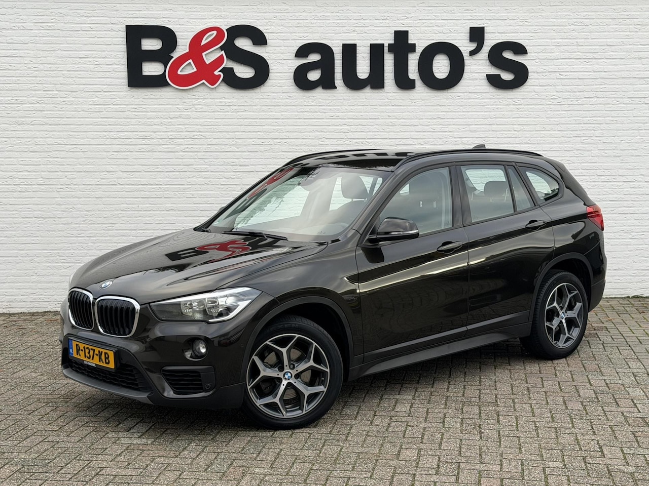 BMW X1 - SDrive18i Automaat Clima Cruise Navi Pdc V+A Stoelverwarming Elek. A-klep - AutoWereld.nl