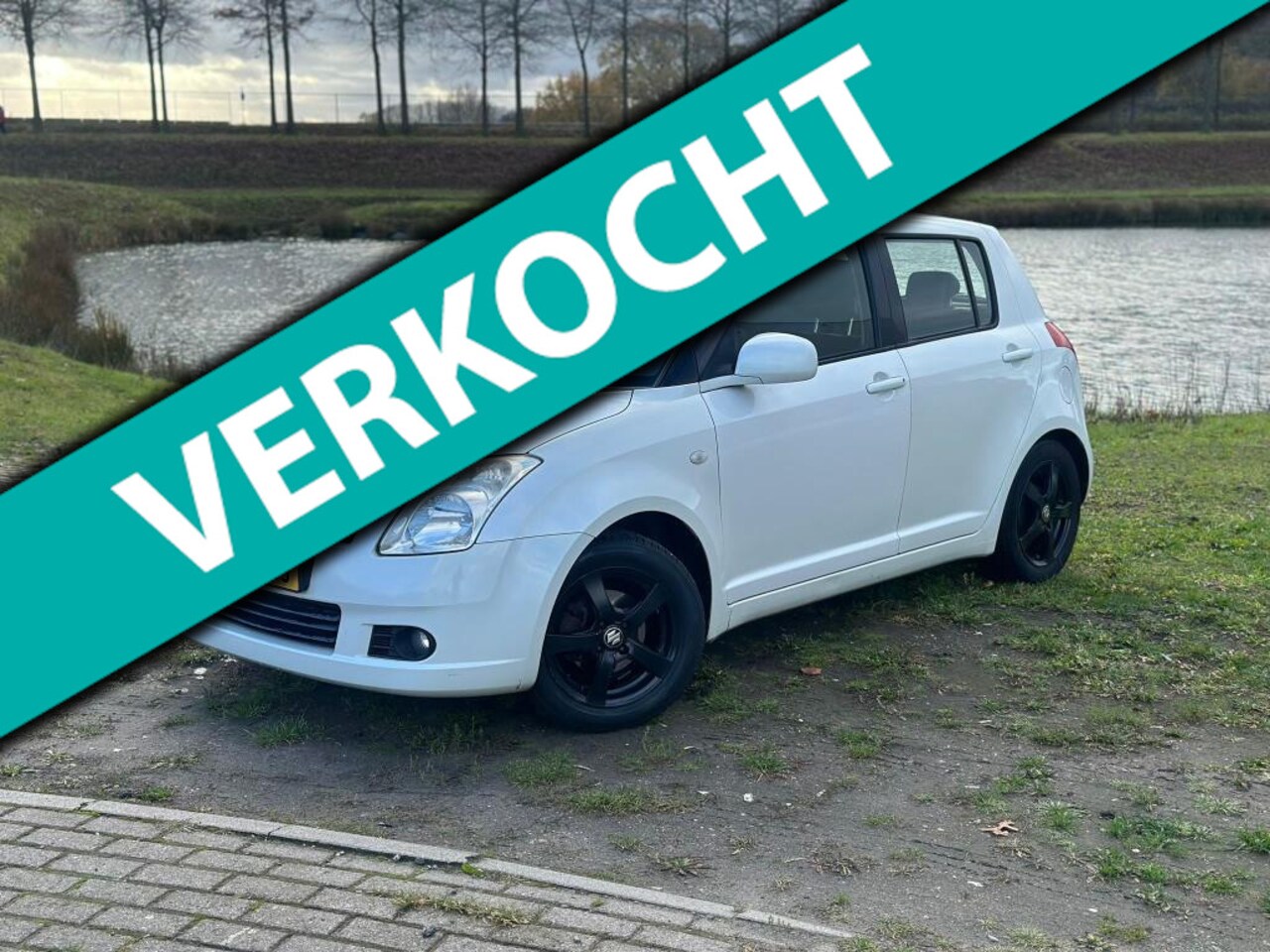 Suzuki Swift - 1.3 Shogun 1.3 Shogun (NIEUWE APK, LEDER, STOELVERWARMING, AIRCO, MULTIMEDIA, 5-DEURS, NL-AUTO) - AutoWereld.nl