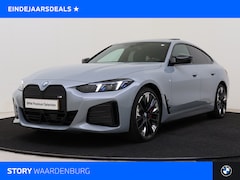 BMW i4 - M50 / Schuif-kanteldak / Achteruitrijcamera / M Adaptief onderstel / Adaptieve LED / Stoel