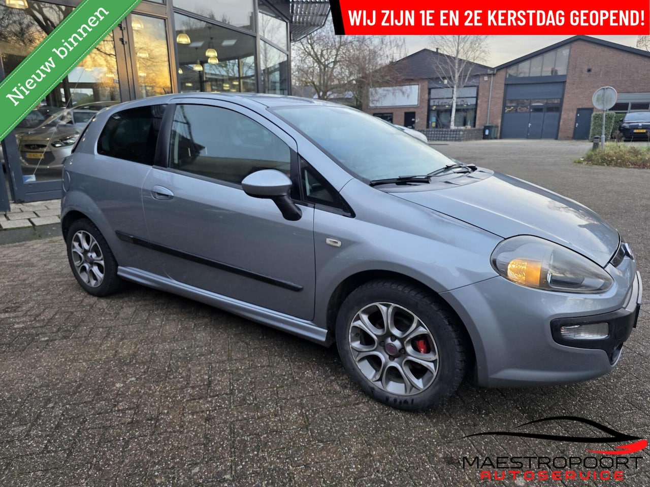 Fiat Punto Evo - | 1.4 Racing | 2010 | Clima | USB | Luxe - AutoWereld.nl