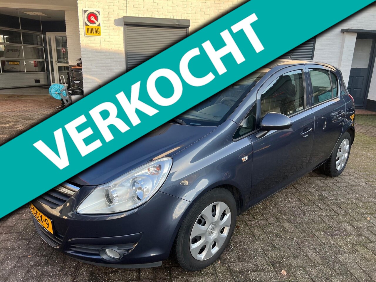 Opel Corsa - 1.4-16V Enjoy Vol automaat/airco/trekhaak - AutoWereld.nl