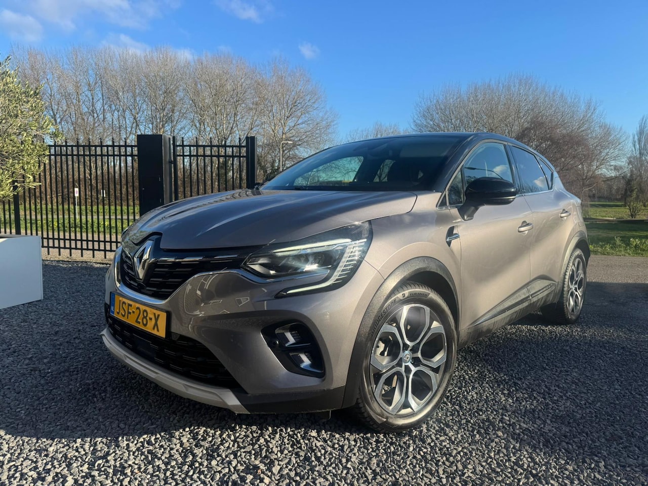 Renault Captur - 1.6 E-Tech Plug-in Hybrid 160 Intens / Camera / Ambient light / - AutoWereld.nl