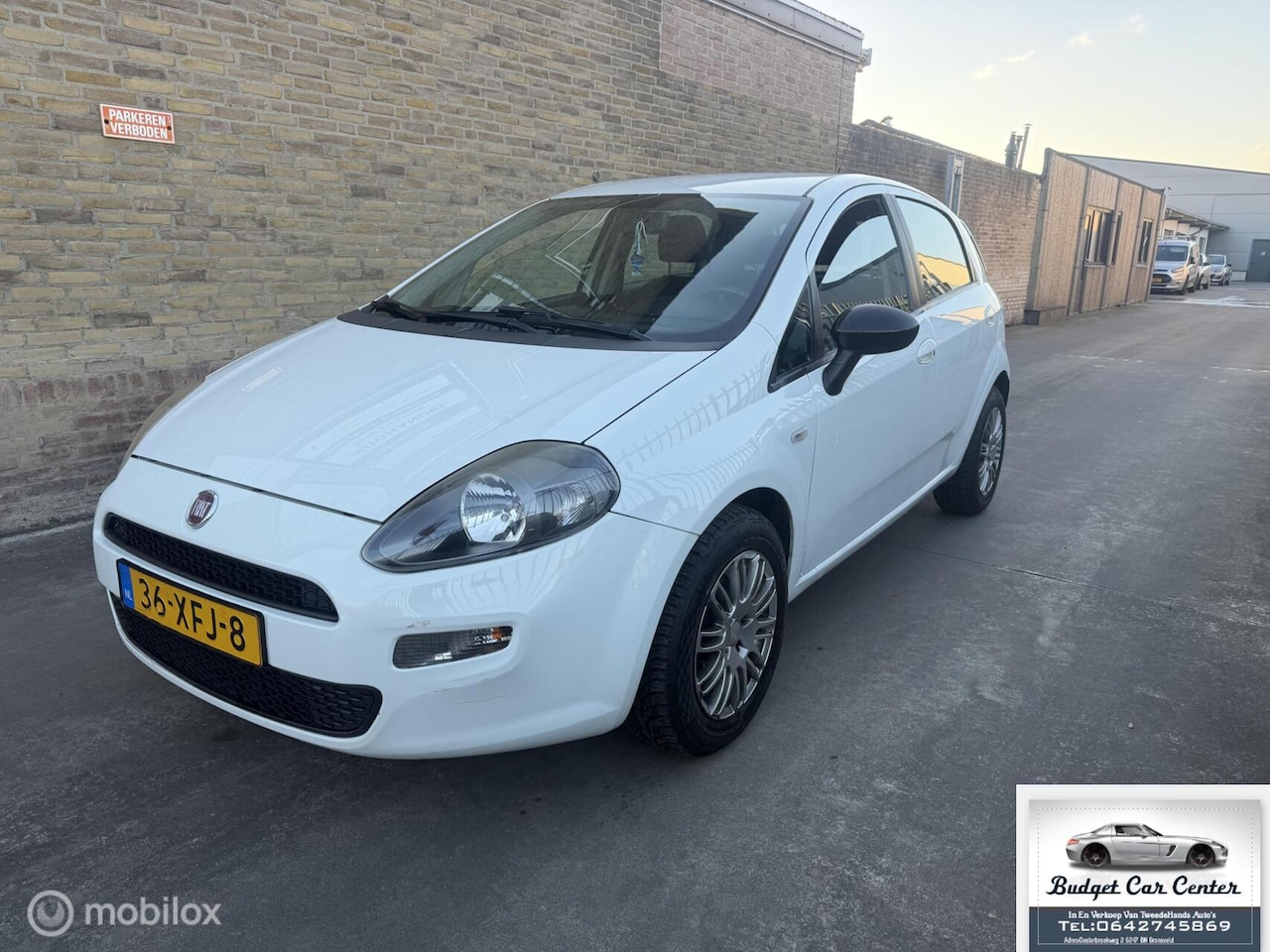 Fiat Punto Evo - 0.9 TwinAir Airco - AutoWereld.nl