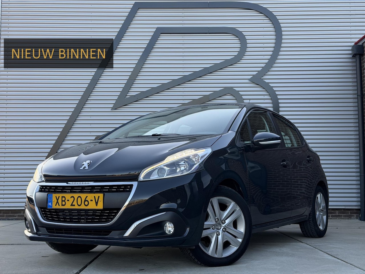 Peugeot 208 - 1.2 PureTech Signature Navi,Airco,Cruise,PDC,N.A.P,Dealer Onderhouden,APK tot 04-2026 - AutoWereld.nl