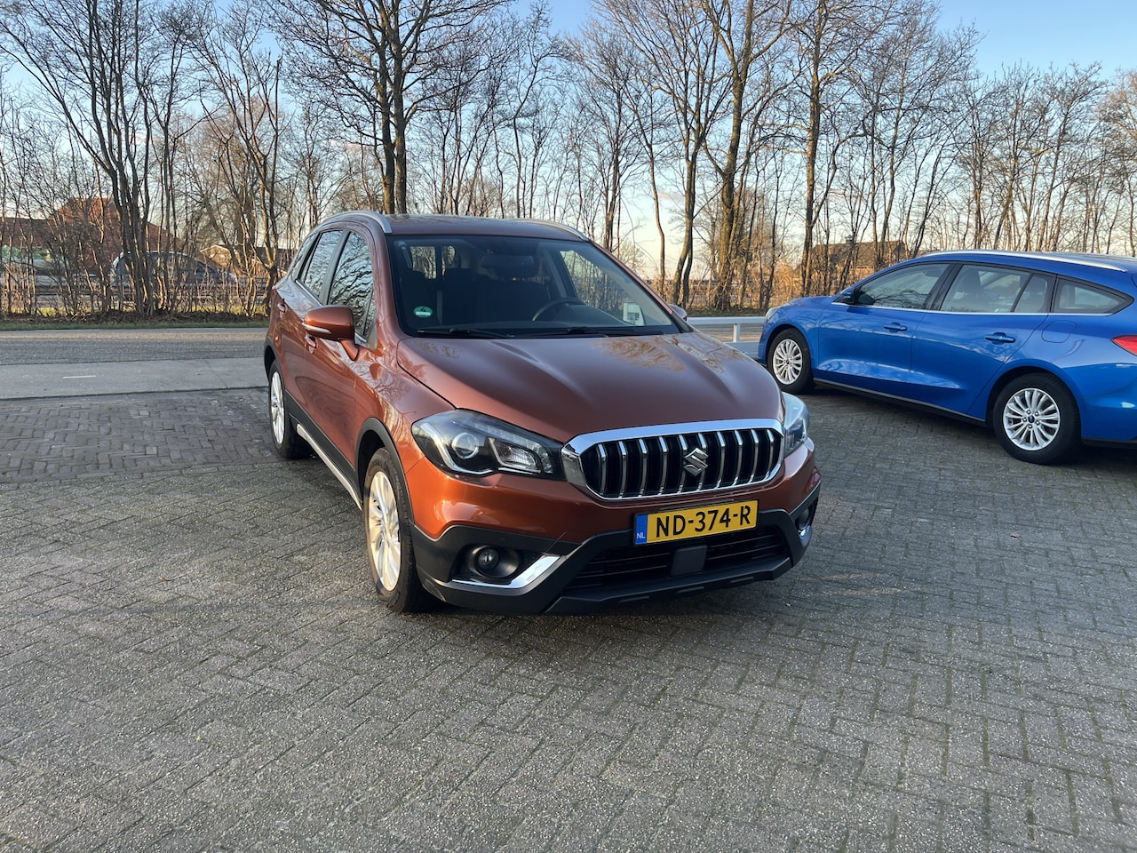 Suzuki S-Cross - 1.0 Boosterjet Exclusive TREKHAAK STOELVERWARMING CARPLAY NAVI - AutoWereld.nl