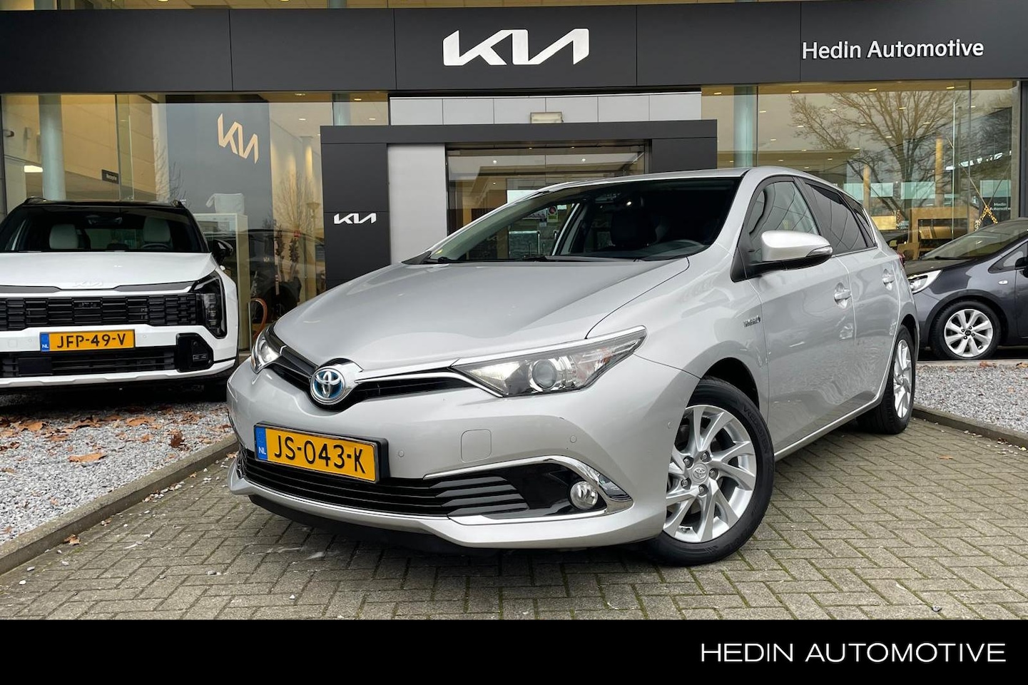 Toyota Auris - 1.8 Hybrid Executive | Trekhaak | Stoelverwarming | Camera | Keyless | - AutoWereld.nl
