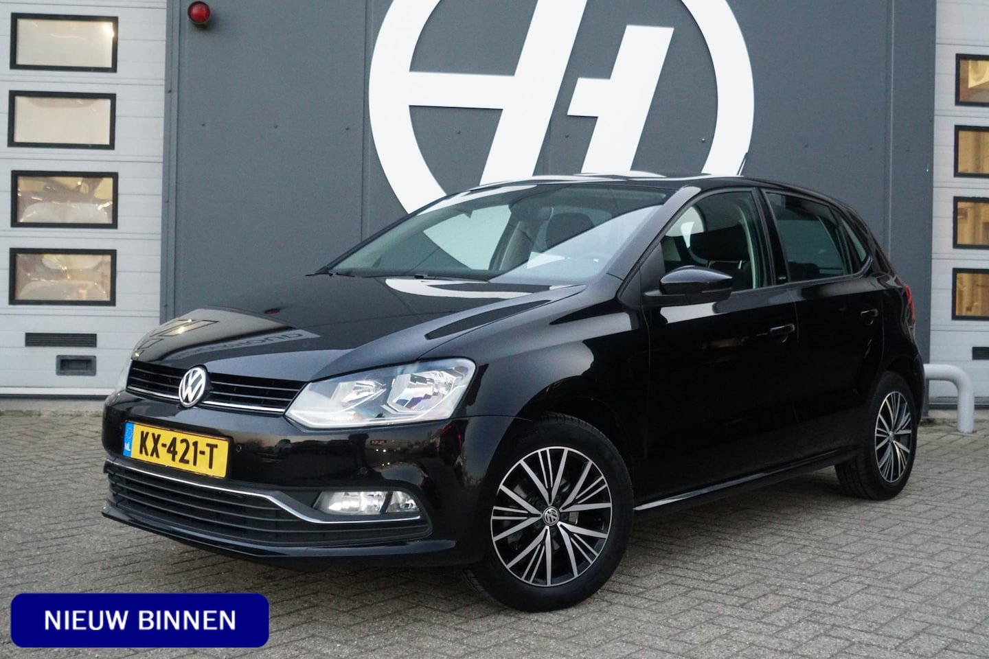 Volkswagen Polo - 1.2 TSI Highline + NAVIGATIE / CRUISE CONTROL / PDC - AutoWereld.nl
