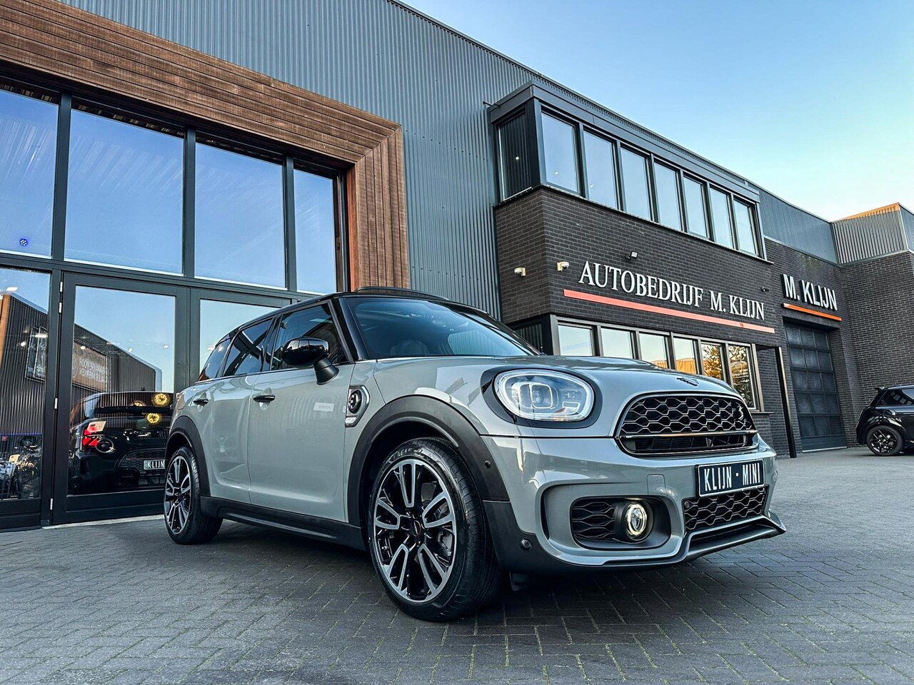 MINI Countryman - Mini 2.0 Cooper S E ALL4 John Cooper Works 220pk Nardo/Camera/Pano/Head up/Btw - AutoWereld.nl
