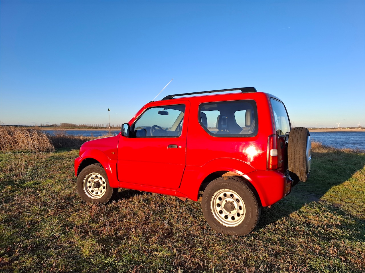Suzuki Jimny - 1.3 JLX 4WD - AutoWereld.nl