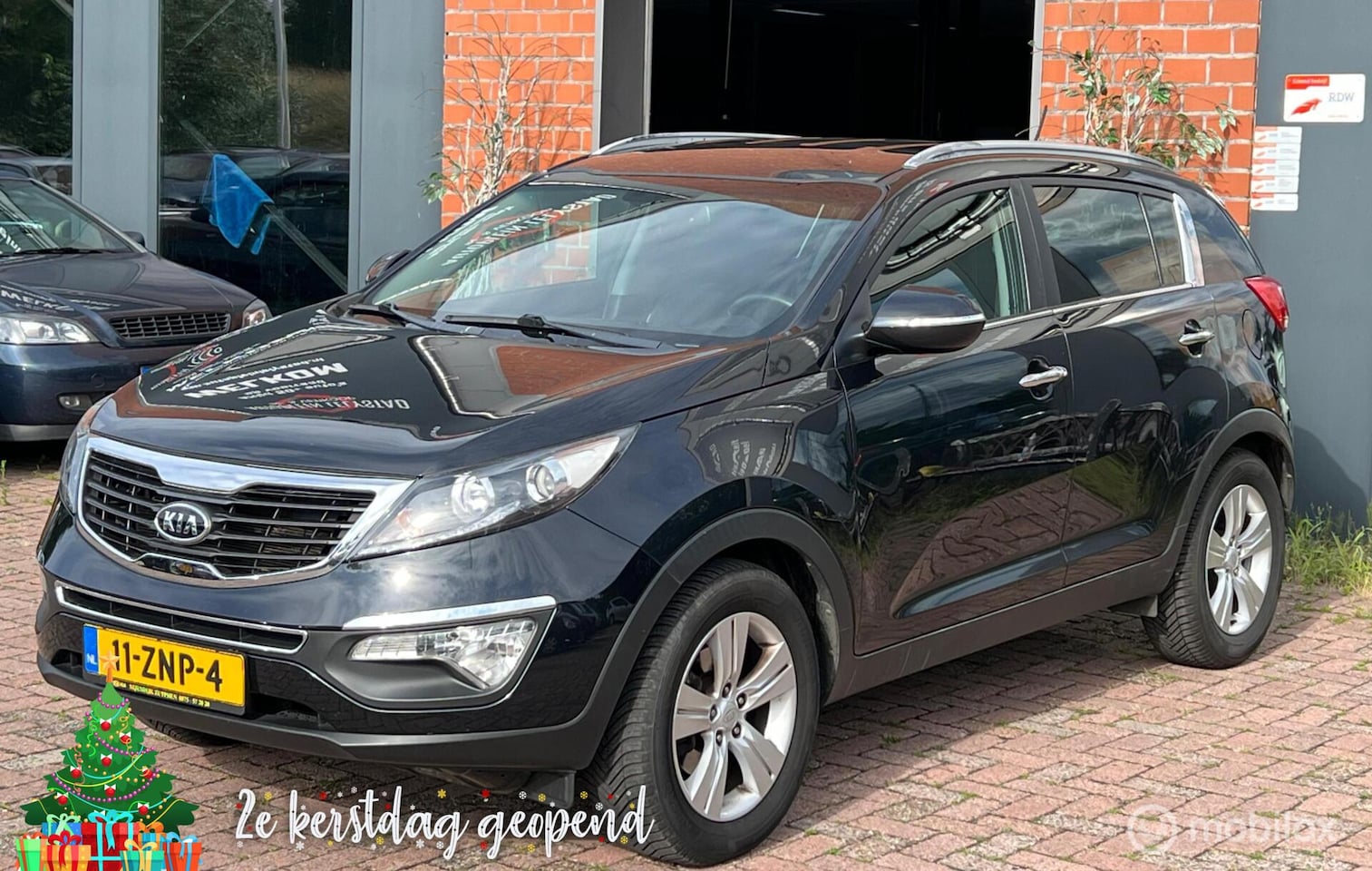 Kia Sportage - 1.6 GDI Plus Pack Airco cruise controle elek. Ramen - AutoWereld.nl