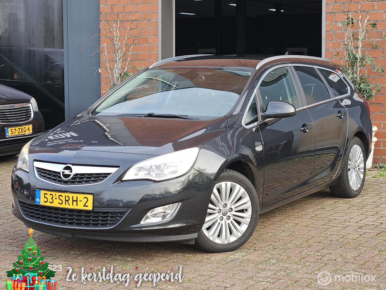 Opel Astra Sports Tourer - 1.4 Turbo Sport 1.4 Turbo Sport - AutoWereld.nl