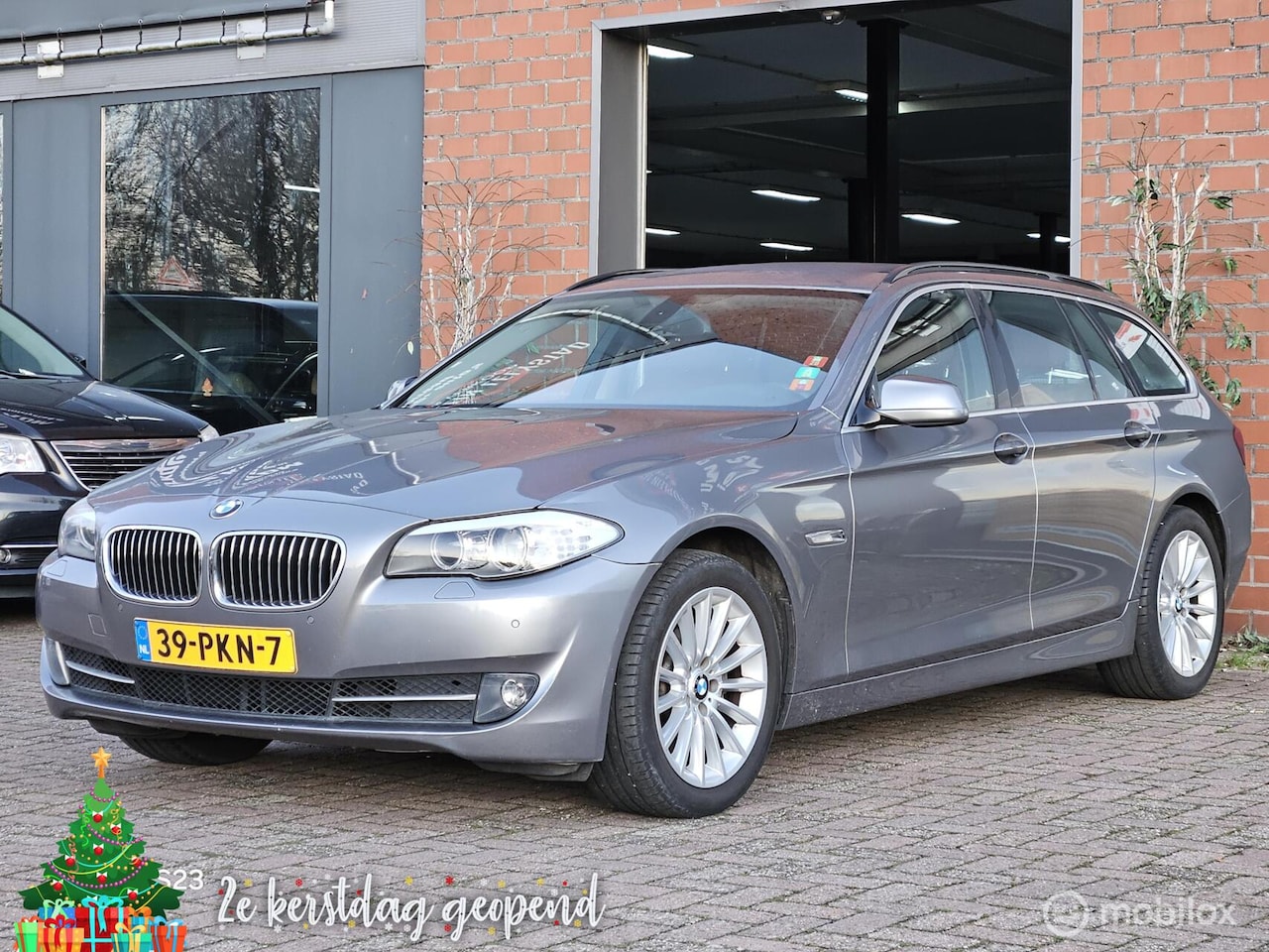 BMW 5-serie Touring - 523i High Executive leer clima navi - AutoWereld.nl