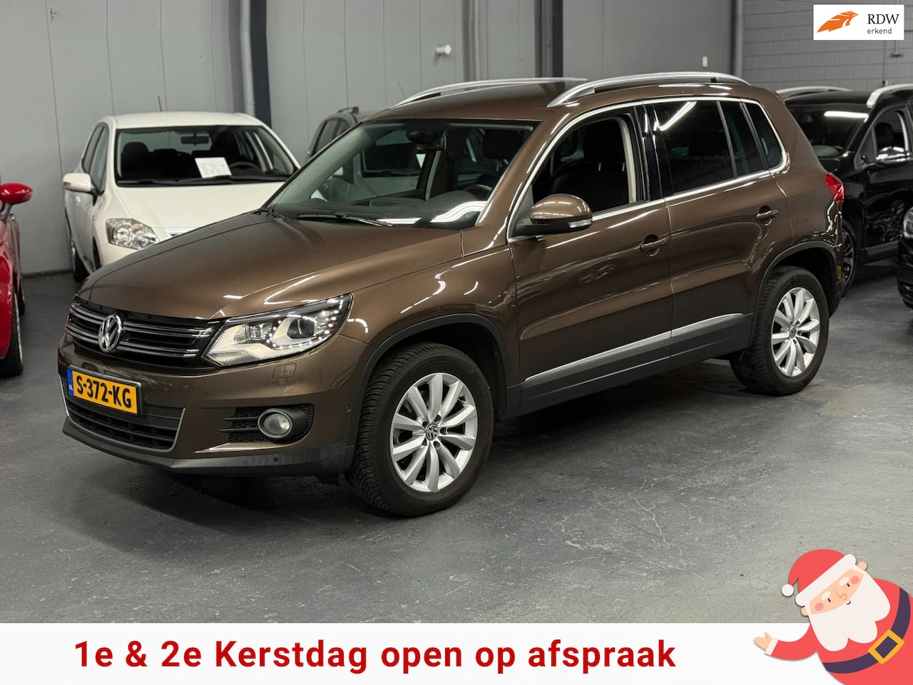 Volkswagen Tiguan - 1.4 TSI Sport&Style Keyless PDC Navi Trekhaak Nieuwe APK NAP - AutoWereld.nl
